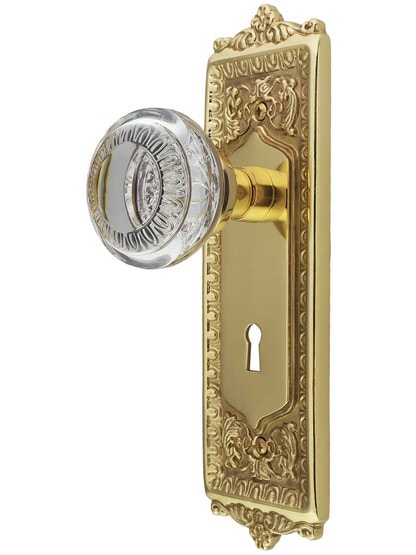 Egg and Dart Design Mortise-Lock Set with Ovolo Crystal-Glass Knobs in Polished Brass.